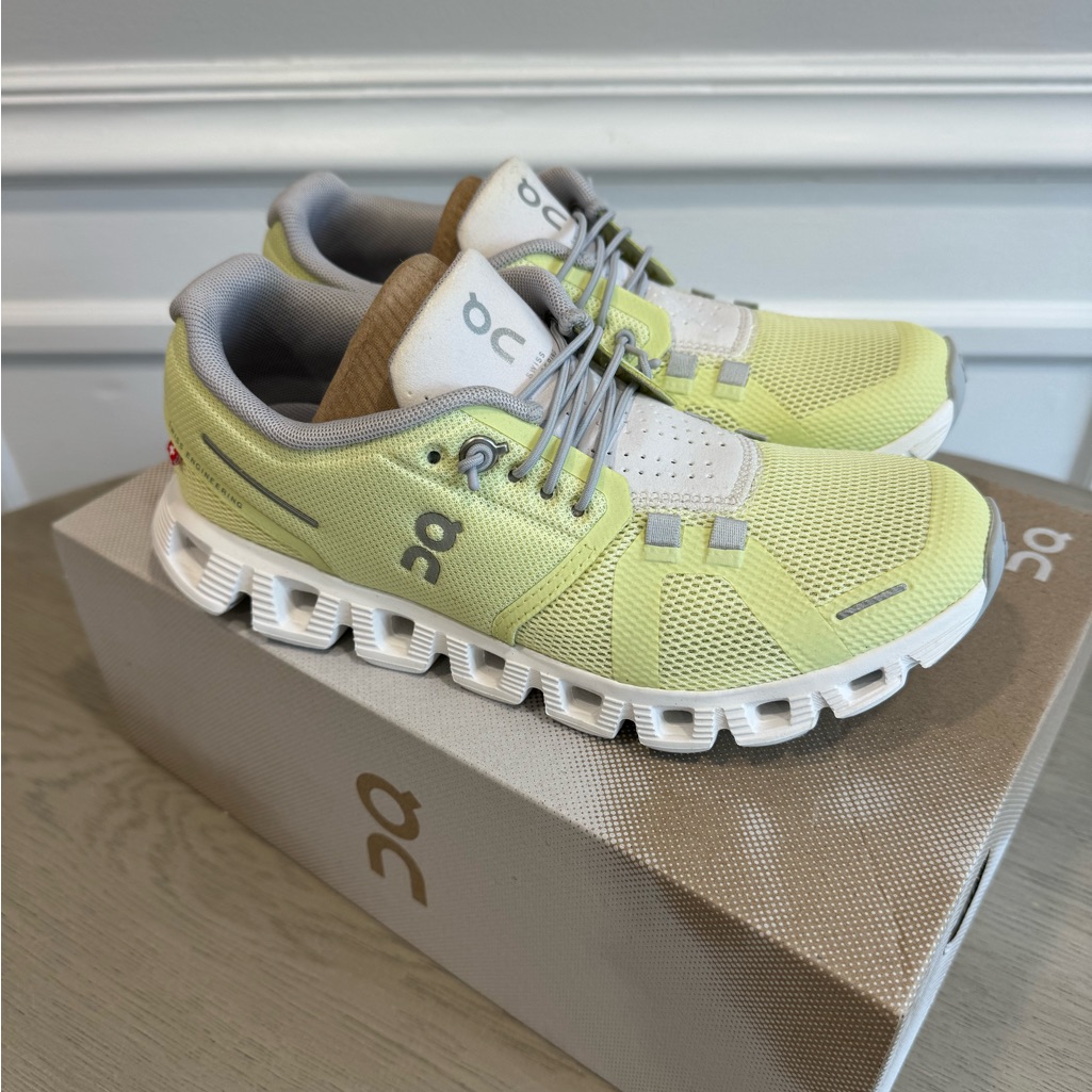 On Running Lemon And White Athletic Shoes
